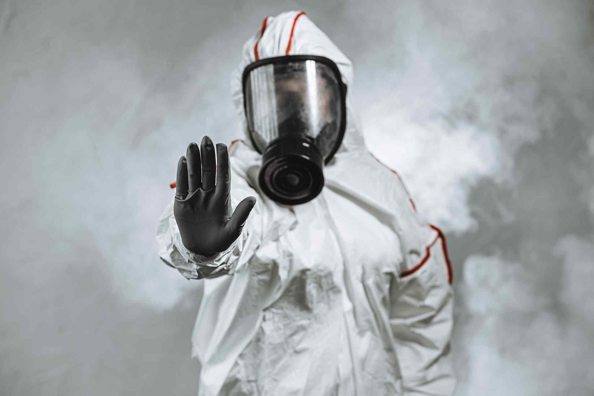 Keep,The,Distance,,Stop,To,Coronavirus.,Disinfector,Male,In,Gas-mask